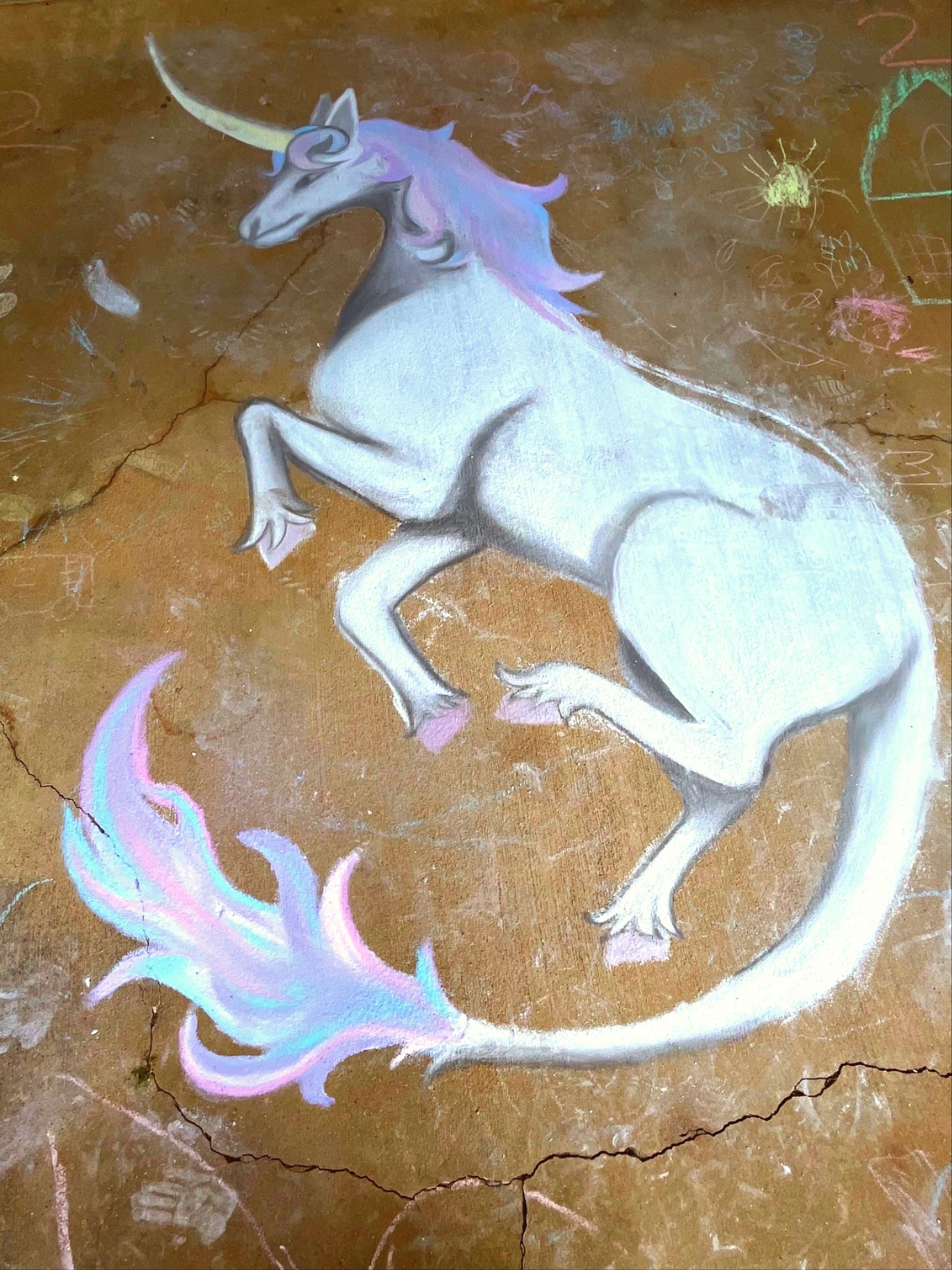 Chalk art creation at Triple Creek Plaza community event in Longview TX